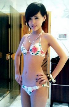 Sexy Asian teen walking in a thong bikini in public!